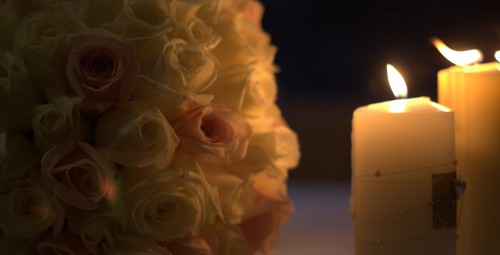 Wedding candles and flower bouquet. Creative Commons: https://flic.kr/p/6R28r9