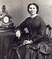 Image of Clara Barton seated at a desk