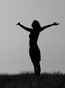 woman with arms outstretched