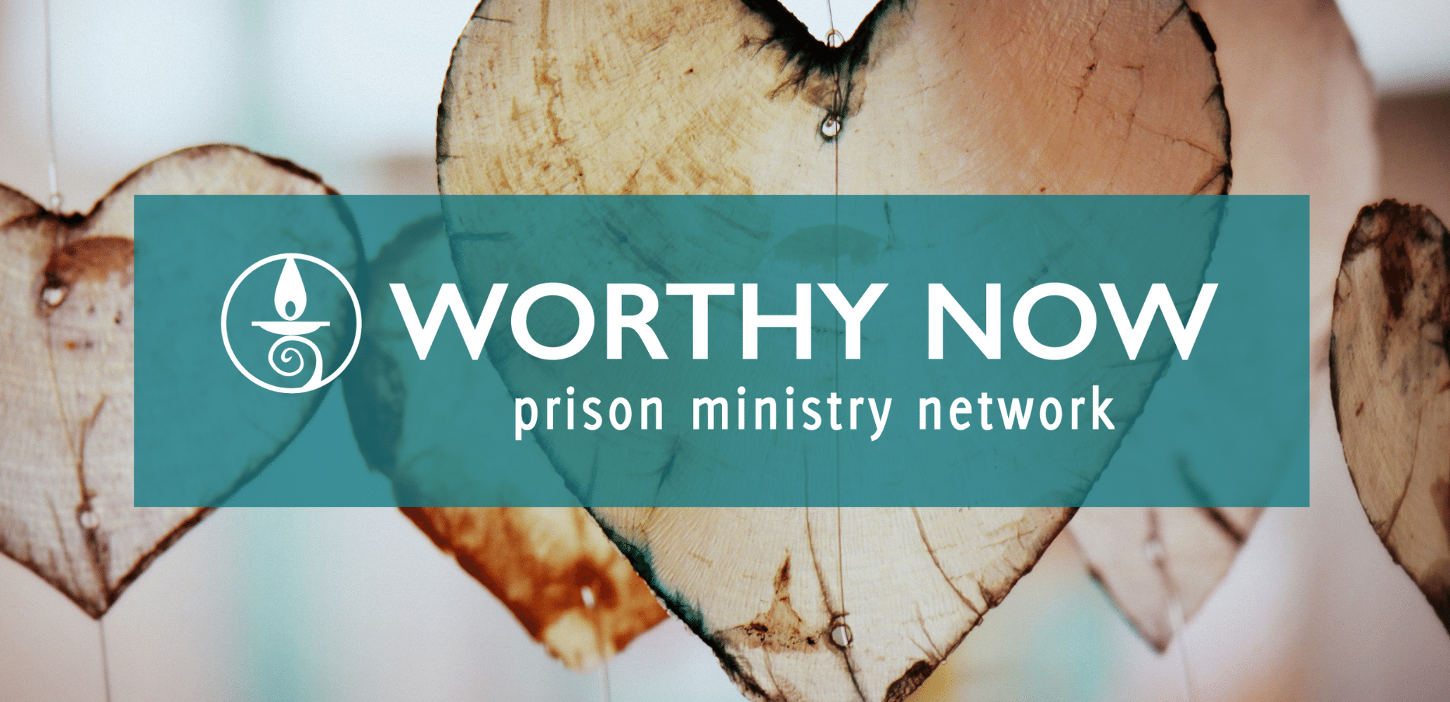 Hearts hanging in background with Worthy Now Prison Ministry Network logo in foreground